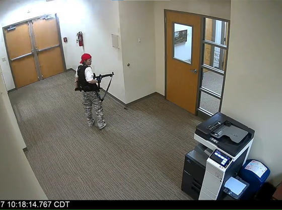 Screenshot of security camera footage from the Tennessee school shooting.
